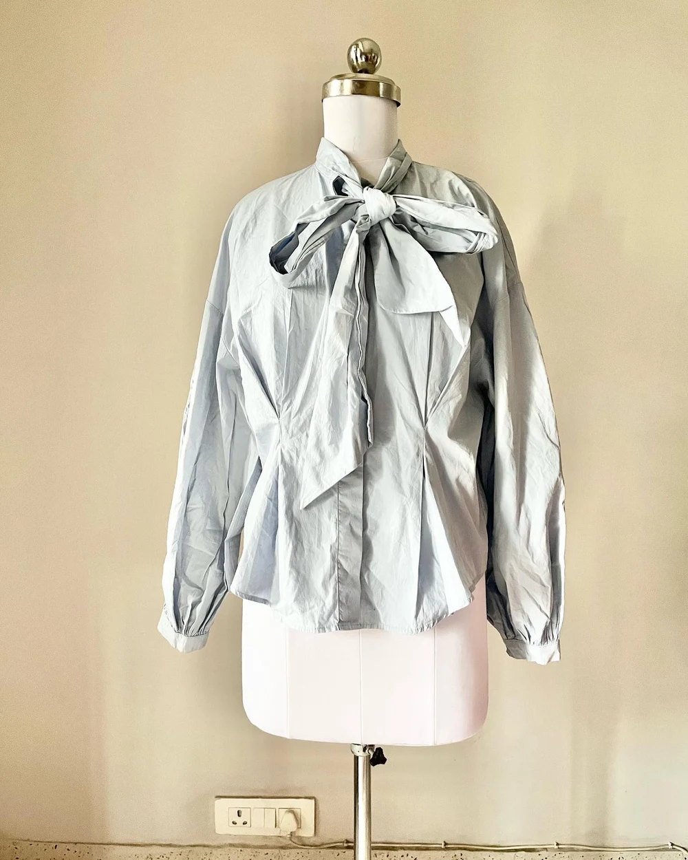 Pastel blue tie-up neck shirt 